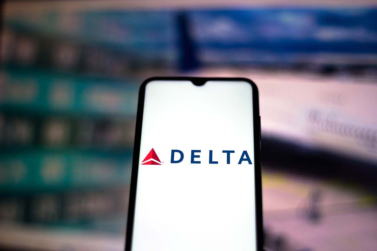Close up of Delta Airlines logo displayed on a smartphone screen, representing the Delta class action.