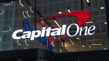 Close up of illuminated Capital One signage at night, representing the Capital One class action.