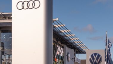 Audi and Volkwagen signs at dealer.