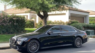 A black Mercedes S580 parked on the side of the road, representing the Mercedes-Benz class action.