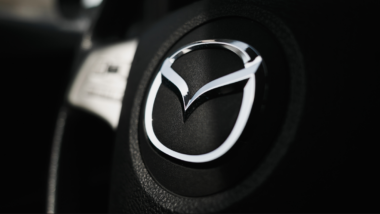 Mazda logo on the steering wheel.
