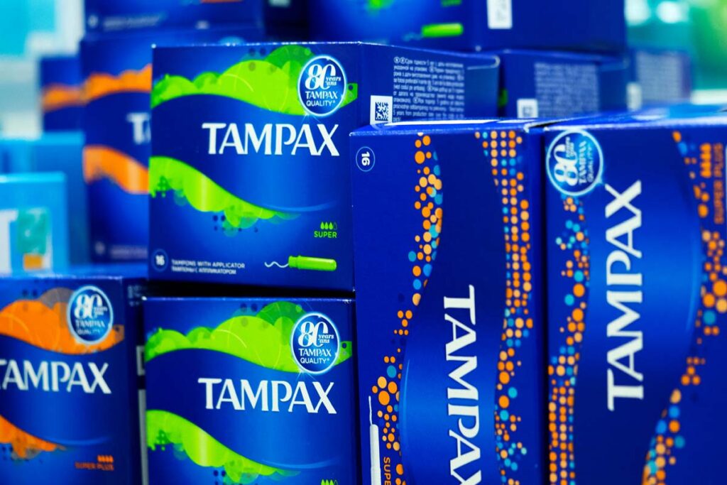 Close up of various product packaging for Tampax, representing the Tampax pure cotton class action.