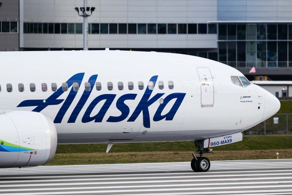 Close up of an Alaska Airlines aircraft on a runway, representing the Alaska Airlines lawsuit.