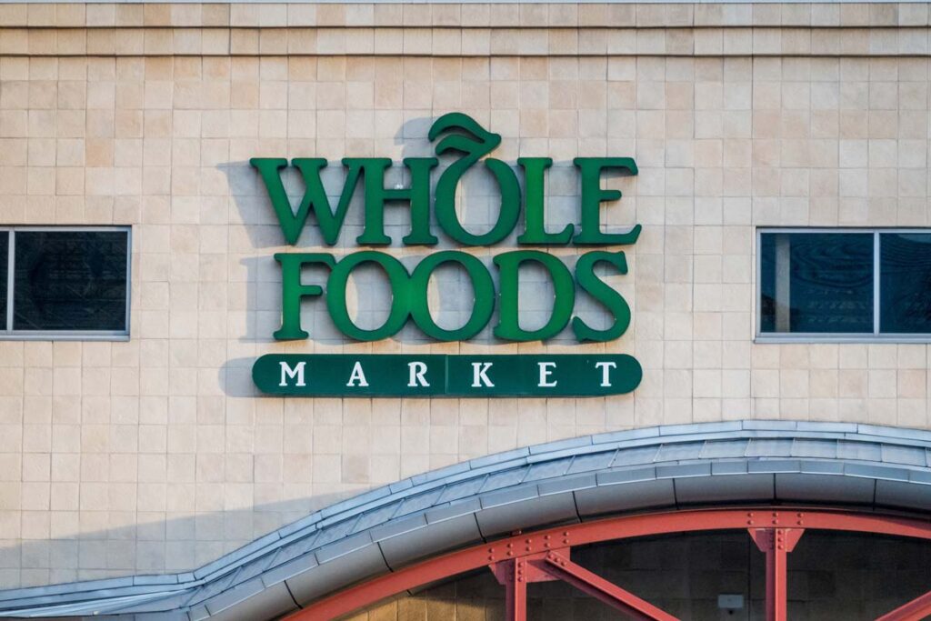 Whole Foods store exterior signage depicting the Whole Foods class action lawsuit.