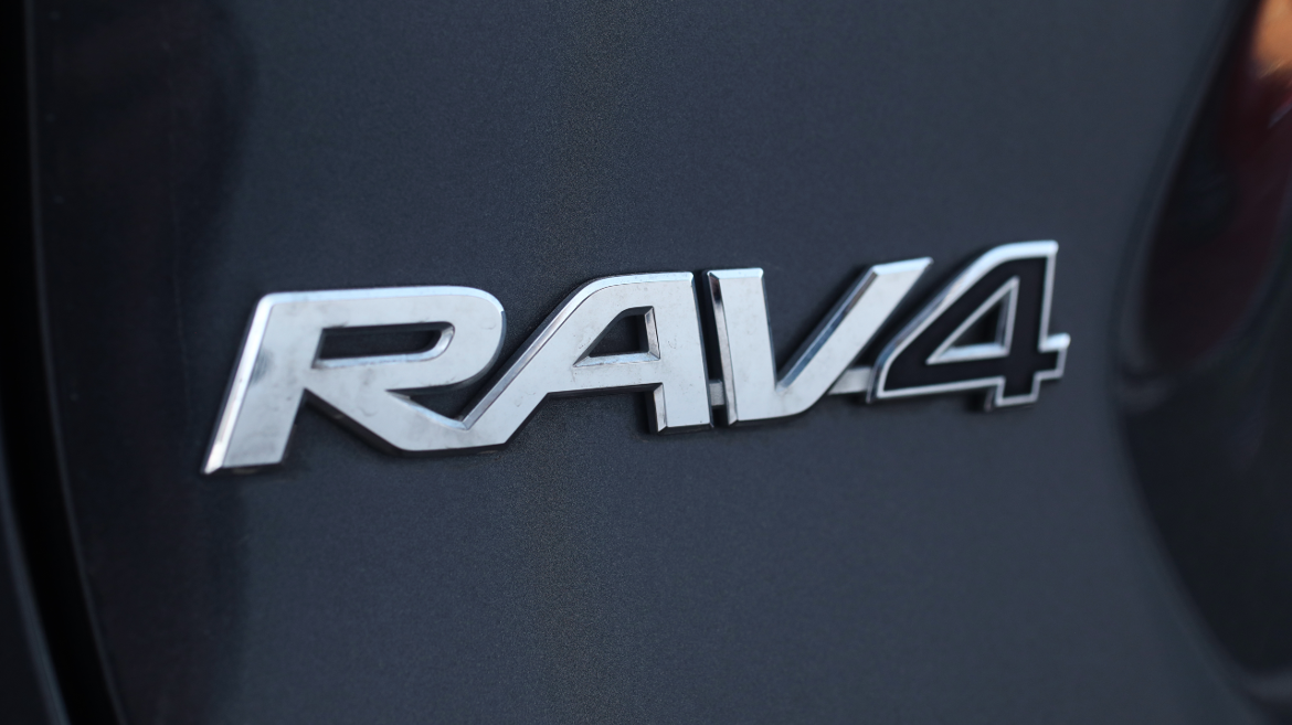 Toyota Rav4 logo on car. 