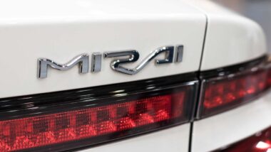 Mirai emblem on the bumper of a Toyota Mirai vehicle, representing the Toyota class action.