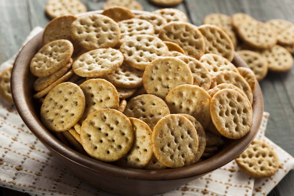 Close up of round wheat crackers in a bowl, representing the Back to Nature false advertising lawsuit.