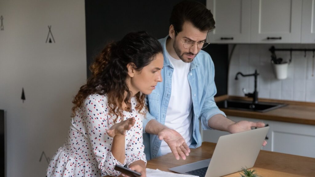 Couple trying to understand their contract.