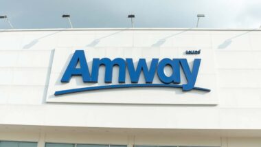 Close up of Amway signage, representing the Amway settlement.