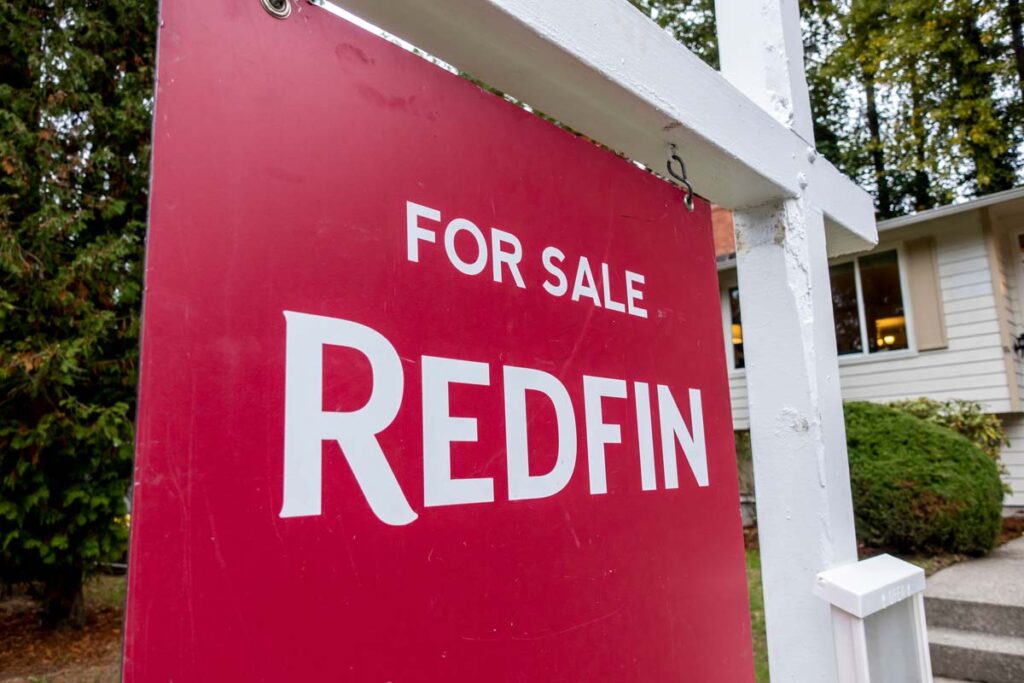 Close up of Redfin for sale signage, representing the Redfin class action.