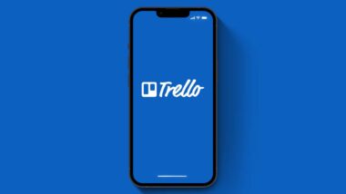 Trello logo displayed on a smartphone screen, representing the Trello data breach.