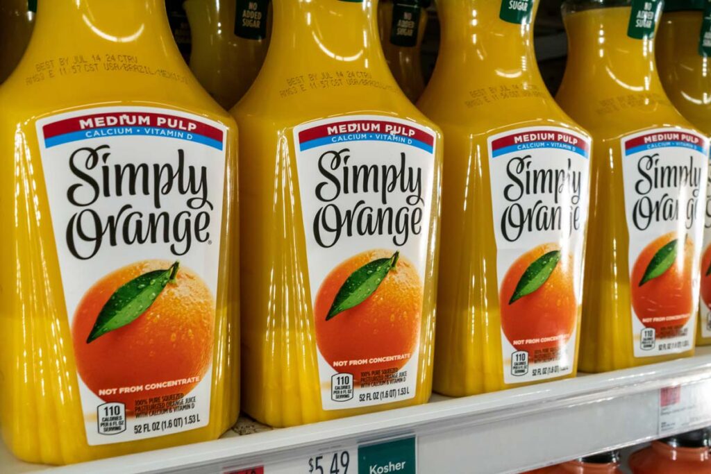 Simply Orange drink products for sale in a supermarket, representing Simply Orange PFAS class action lawsuit.