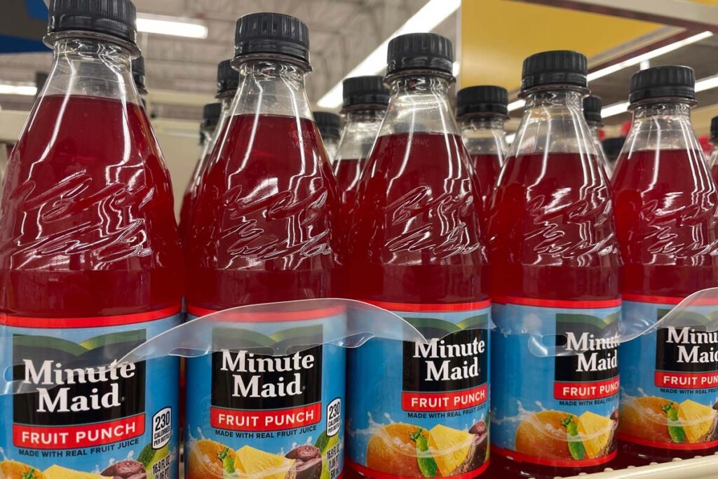 Close up of Minute Maid Fruit Punch bottles on a supermarket shelf, representing the Minute Maid class action.