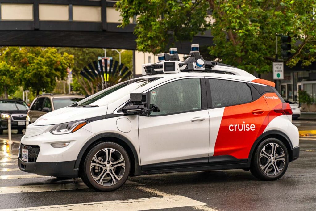 A cruise self driving car on the road, representing the GM Cruise recall.