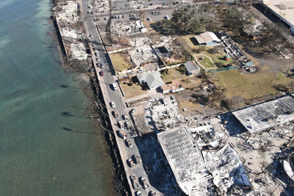 Aerial view of devastated land caused by the Lahaina wildfires, representing the Hawaii Lahaina wildfires settlement.