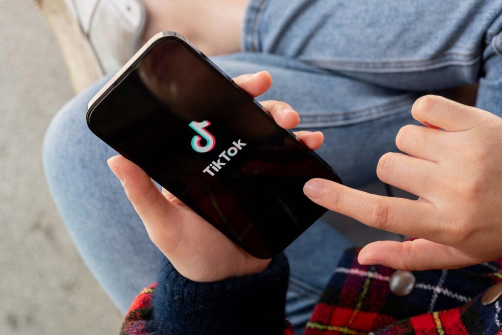 Close up of TikTok app displayed on a smartphone screen, representing the TikTok class action.