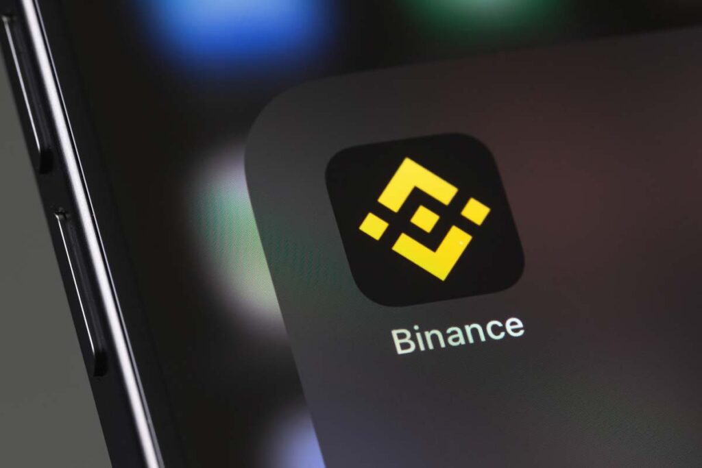 Close up of Binance mobile app displayed on a smartphone screen, representing the Binance class action.