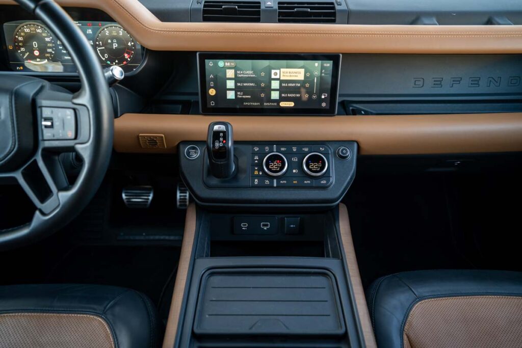 Interior of a Land Rover Defender representing the Jaguar Land Rover class action.