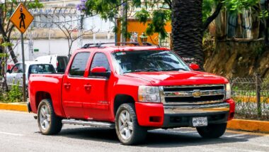 Red Chevy Silverado representing the GM class action.