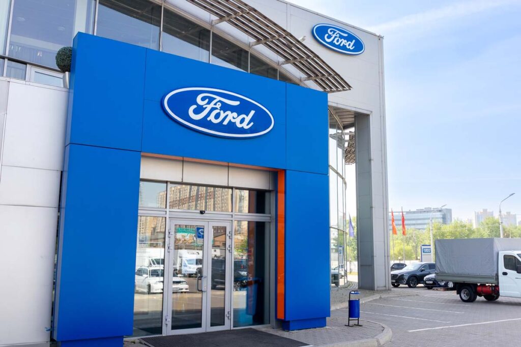 Exterior of a Ford dealership, representing the Ford recalls.