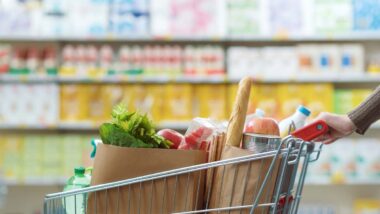 Close up of a shopping cart filled with groceries, representing top recalls for the week of Sept. 9.