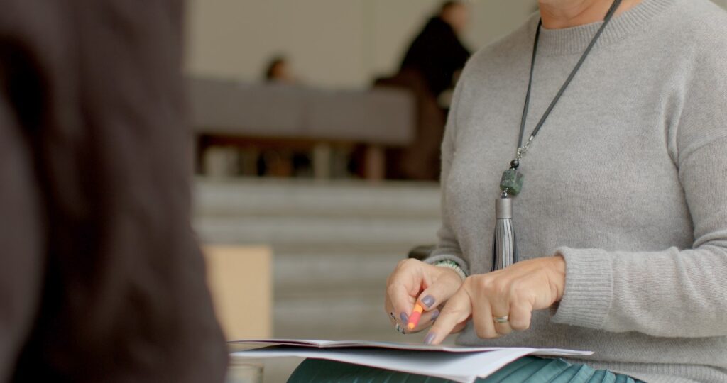 woman providing detailed information on various insurance policies and options