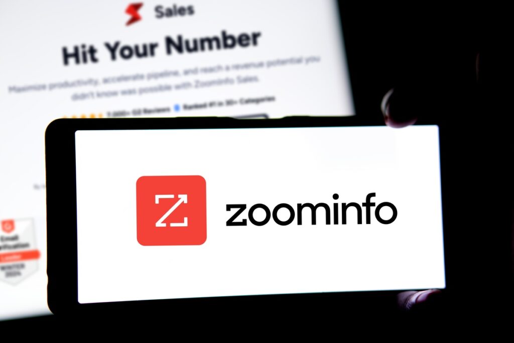 zoominfo logo on a cell phone representing the ZoomInfo class action.