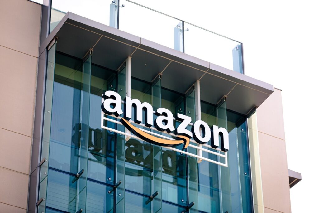 Amazon logo on glass building representing the Amazon class action.