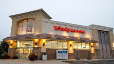 Walgreen store in the evening representing the Walgreens settlement.