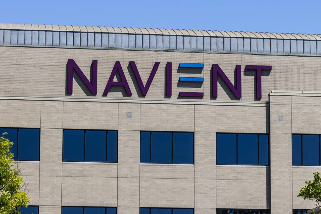 Close up of Navient signage on a building, representing the Navient student loan settlement.