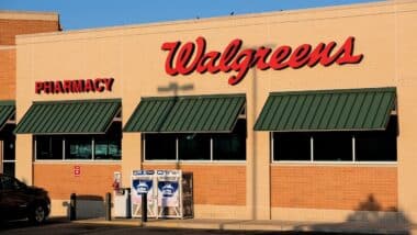 Exterior of a Walgreens pharmacy in the early morning sun