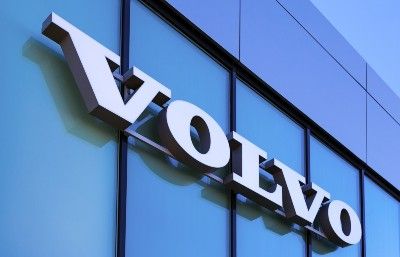 "Volvo" sign on car dealership
