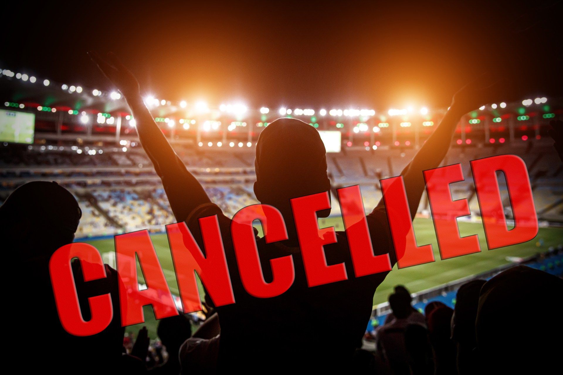 Man cheers at night football game, with the word "cancelled" in red over the photo - Viagogo