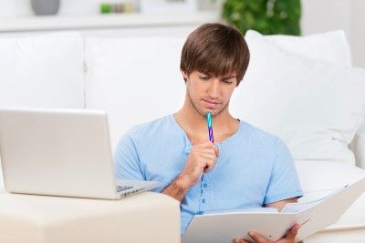 Man studies online from home