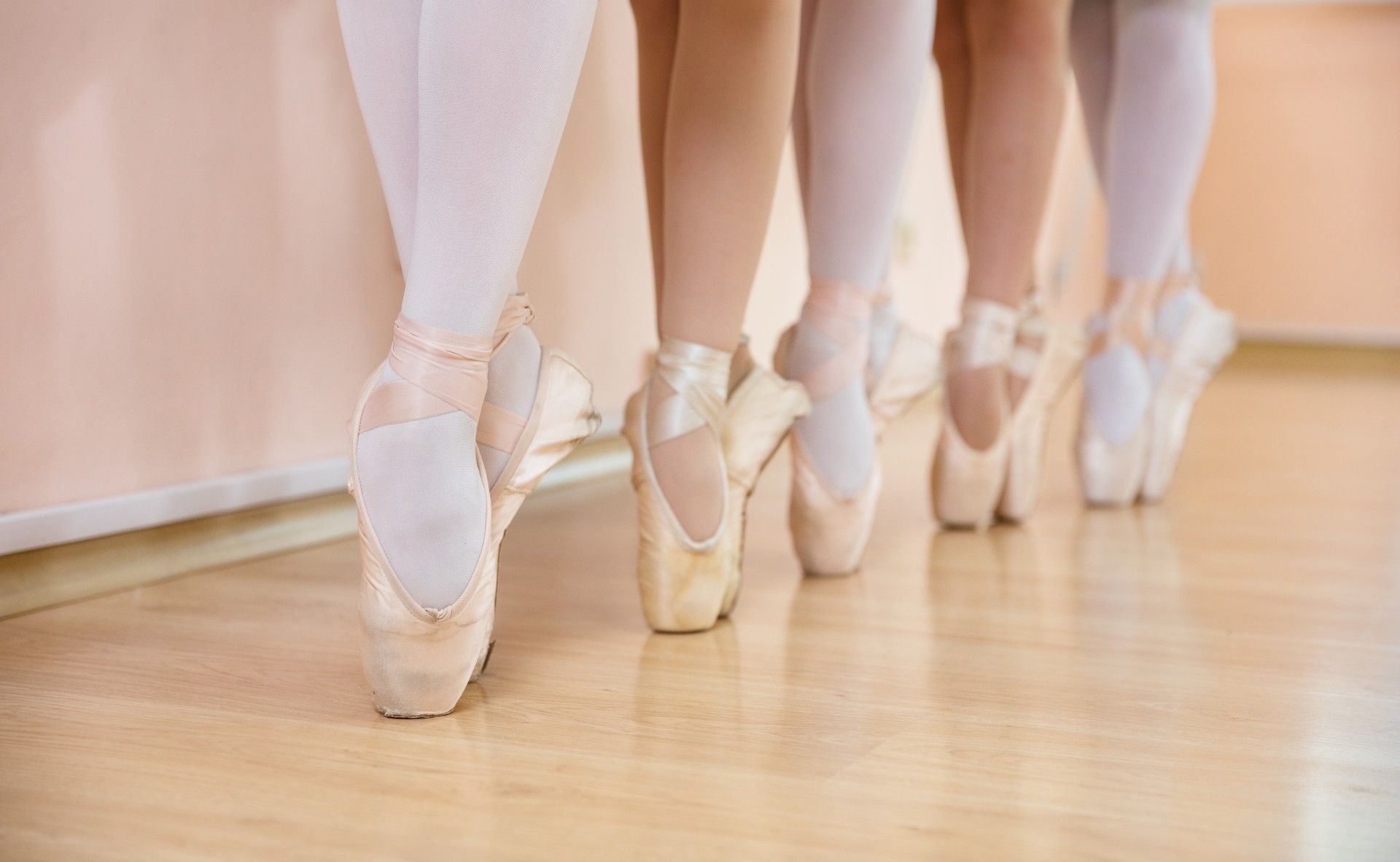 Close-up of row of feet in ballet toe shoes - Argyll Ballet West