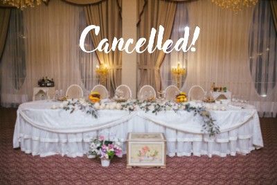 Decorated head table at wedding reception, with word "Cancelled!" - cancelled weddings