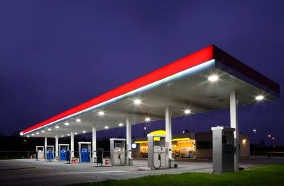 An empty gas station at night - petrol prices