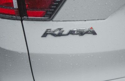 "Kuga" nameplate on white car - Kuga PHEV