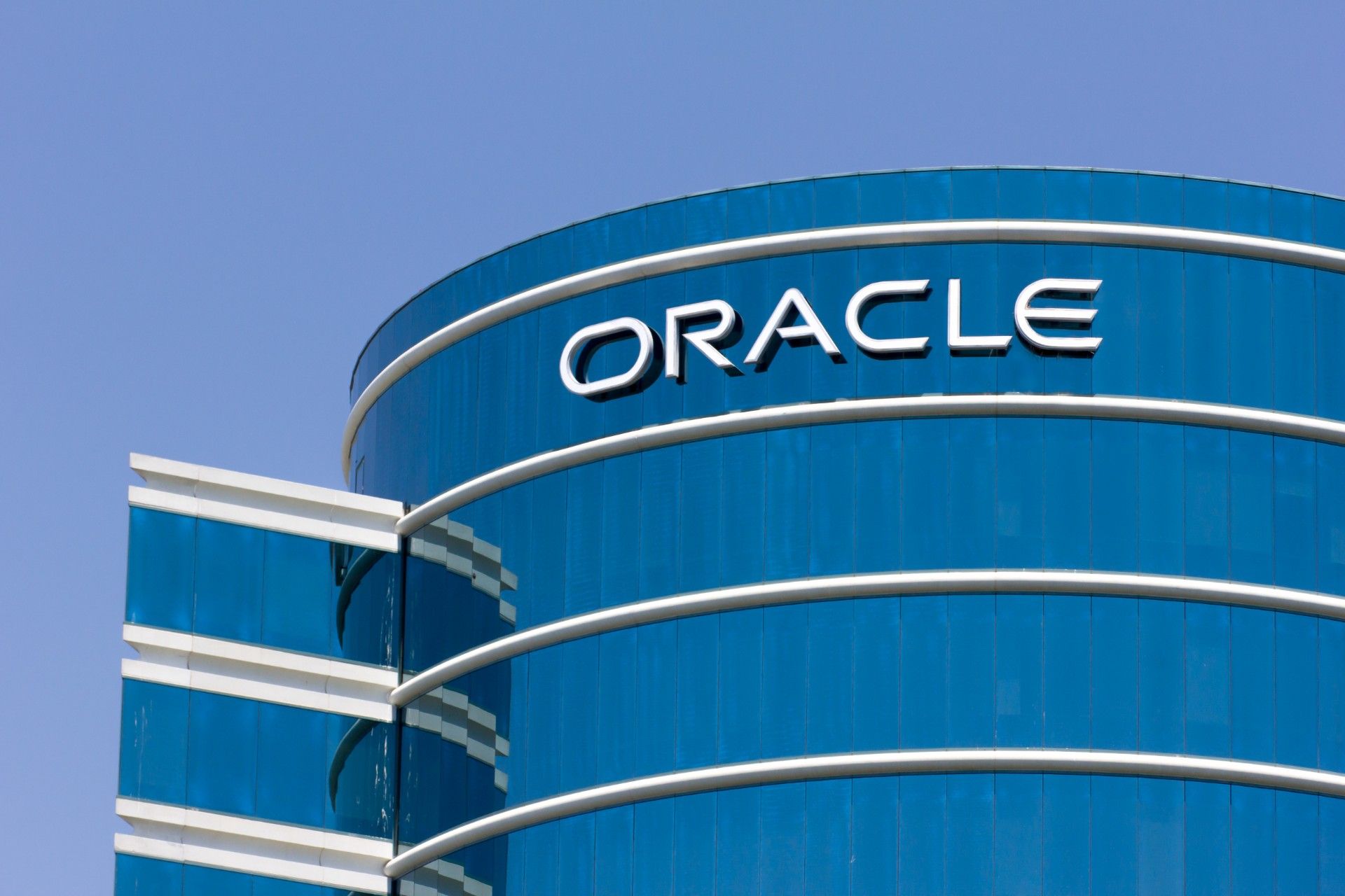 Oracle company sign on glass building
