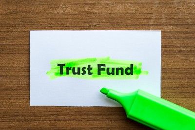 Paper with "Trust fund" highlighted in green, with green highlighter overlapping it - child trust fund