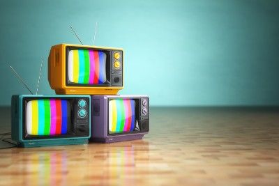 Vintage TV sets showing colored bars - tv licences
