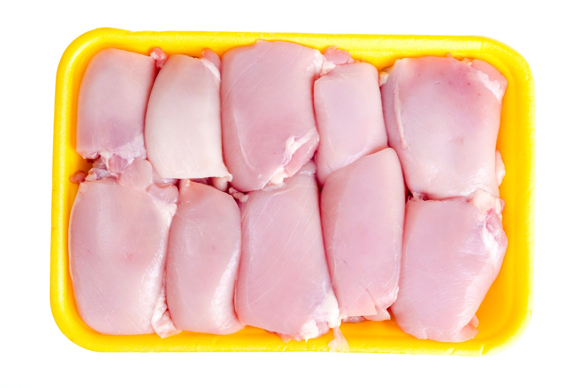 Raw chicken breast in a yellow tray - listeria