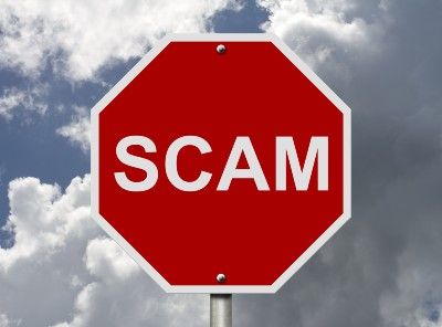Stop sign that reads "scam" instead of "stop" - pension scams