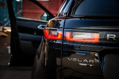 Closeup of Velar nameplate on the back of a black Range Rover - vehicle recalls