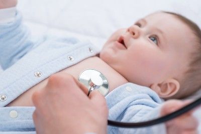 Someone uses a stethoscope on a baby - primodos victims