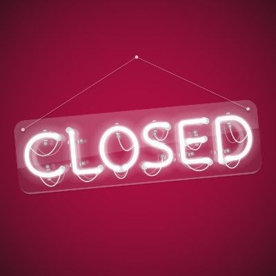 White neon "closed" sign against a red background - pub curfew