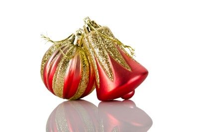 Red and glittery gold Christmas ornaments - glitter ban