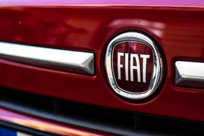 Fiat emblem on red vehicle - fiat-chrysler automobiles