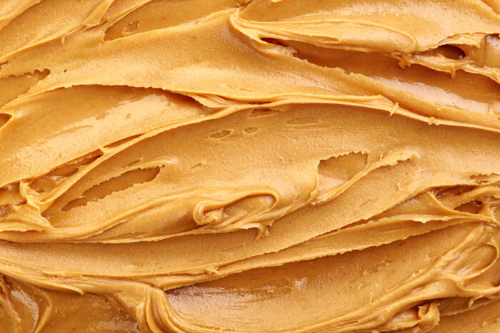 Peanut butter spread filling entire image.