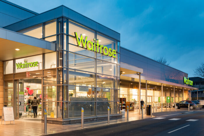 Exterior of the Waitrose store at dusk in Stirling, Scotland.